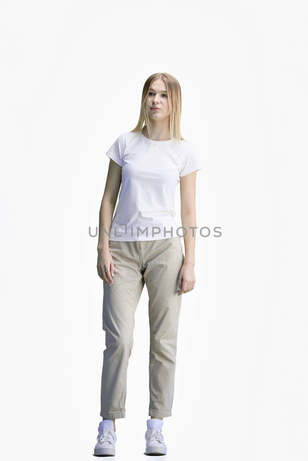 A woman, full-length, on a white background.