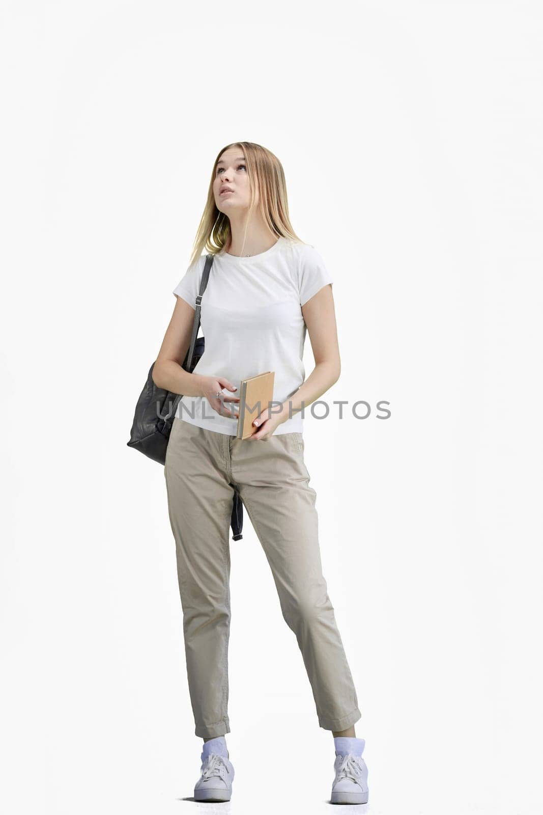 A woman, full-length, on a white background, with a briefcase.