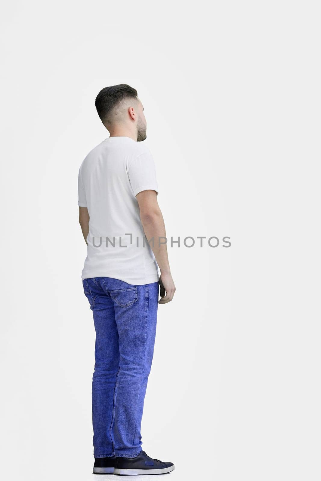 A man, full-length, on a white background.