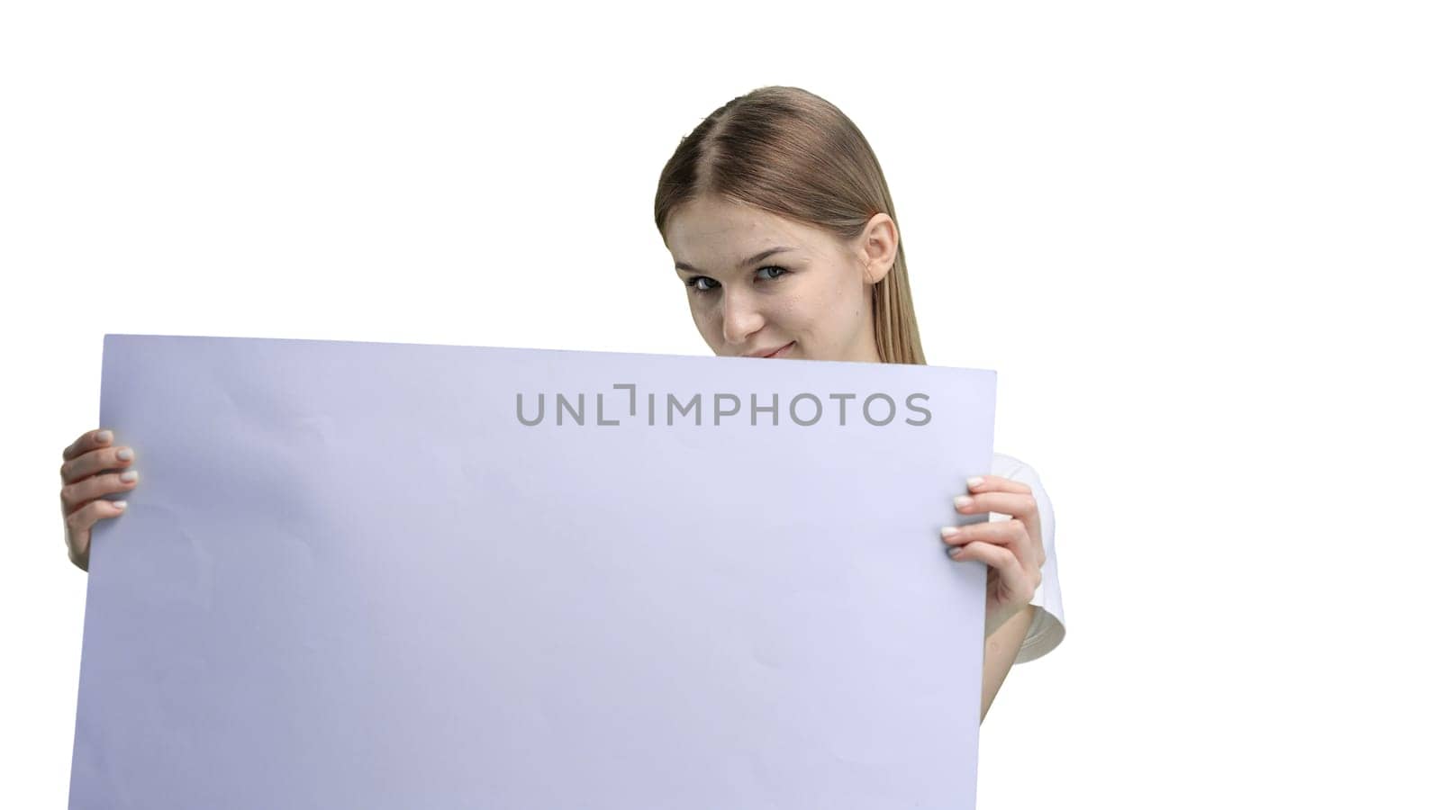 A woman, close-up, on a white background, shows a white sheet.