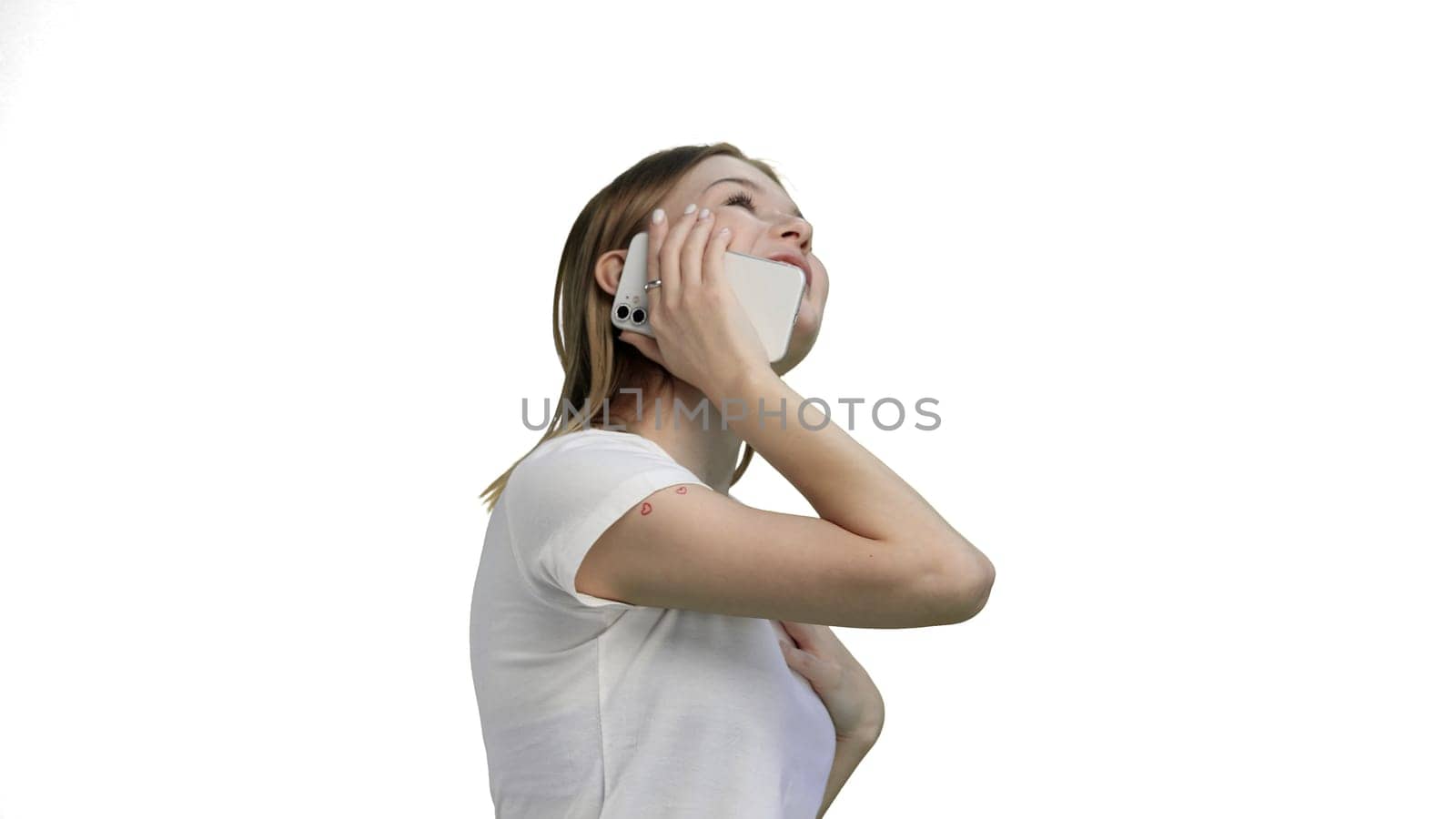 Woman, close-up, on a white background, using a phone.