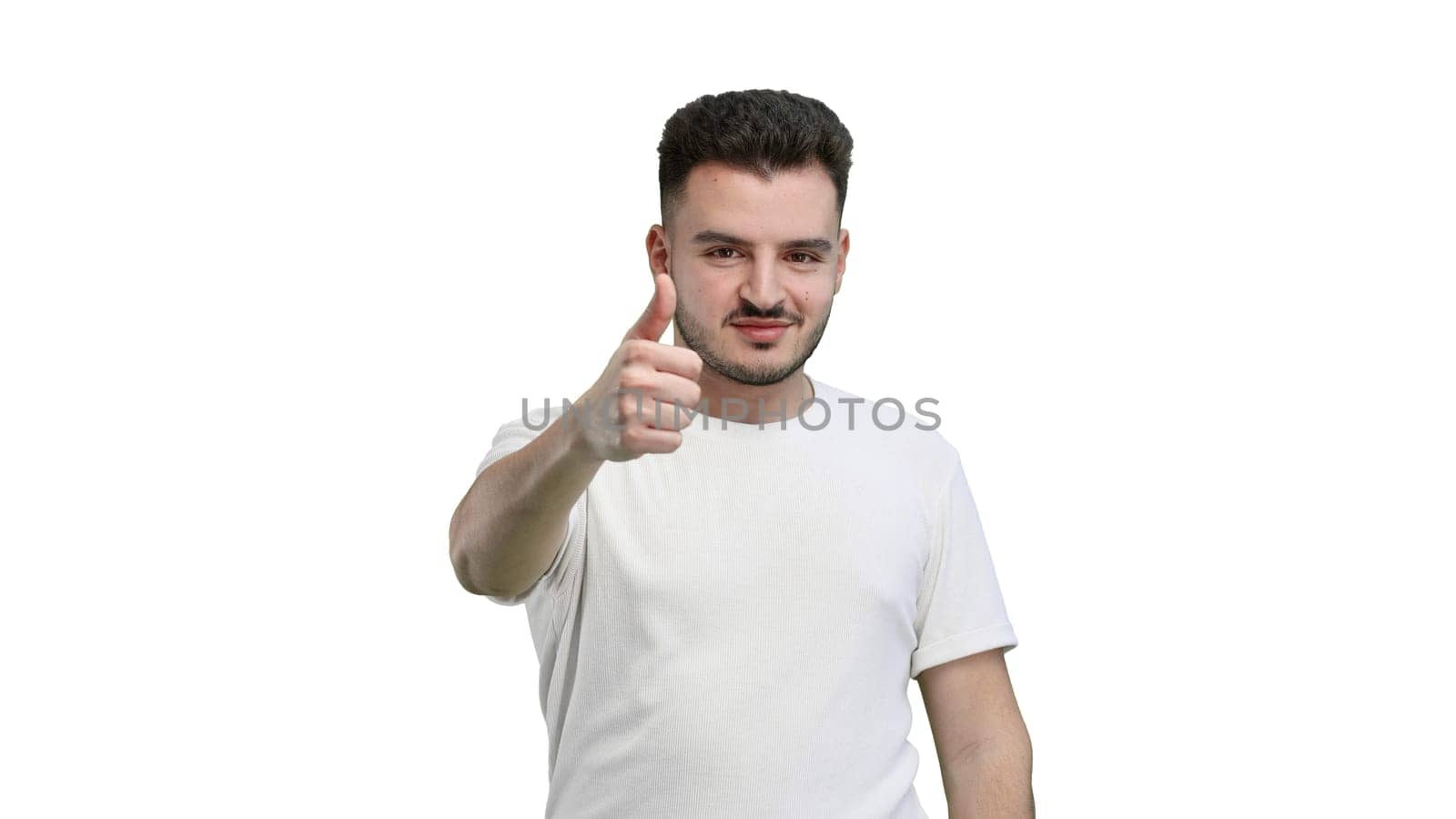 A man, close-up, on a white background, shows a thumbs up.