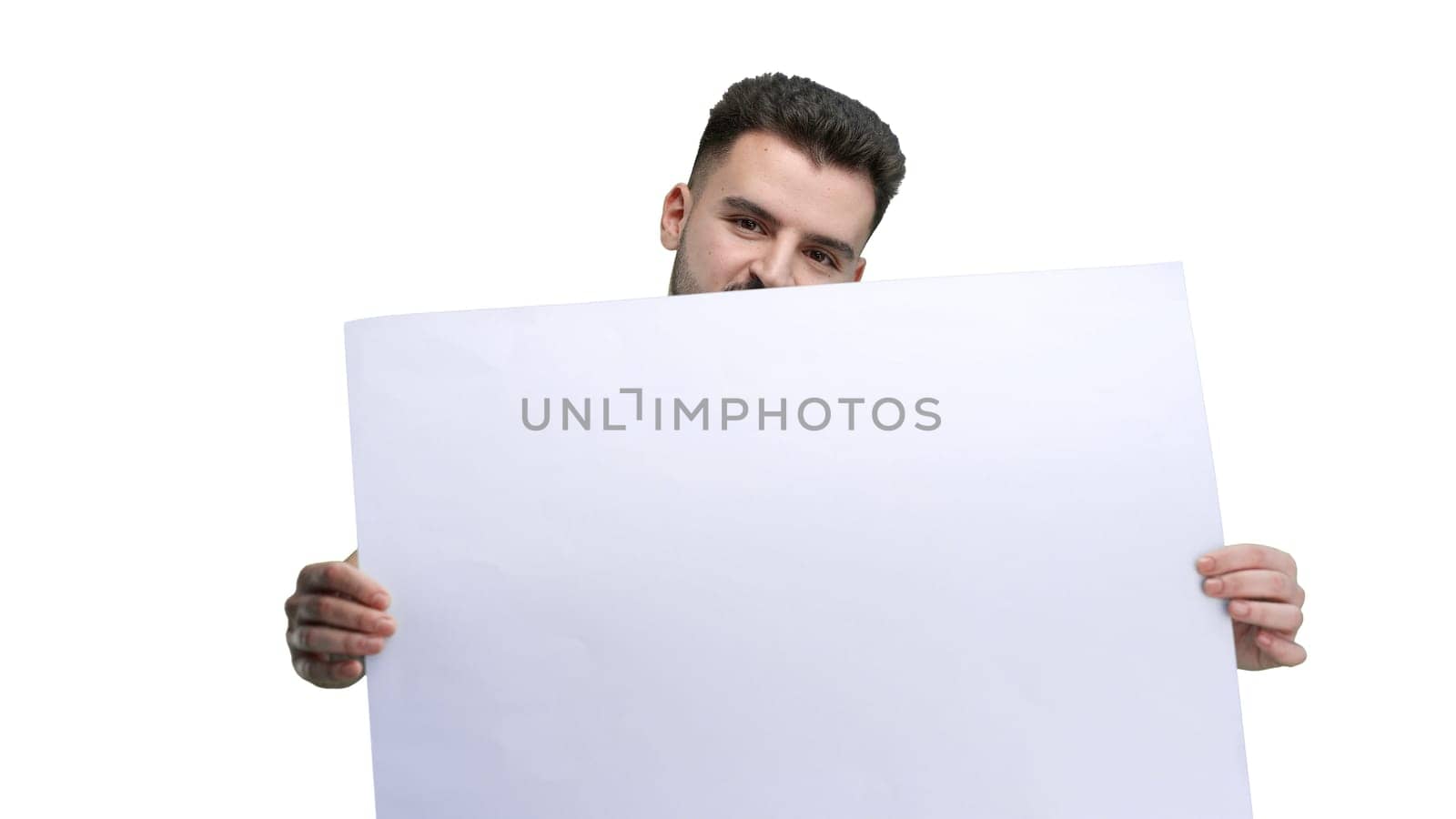 A man, close-up, on a white background, shows a white sheet by Prosto