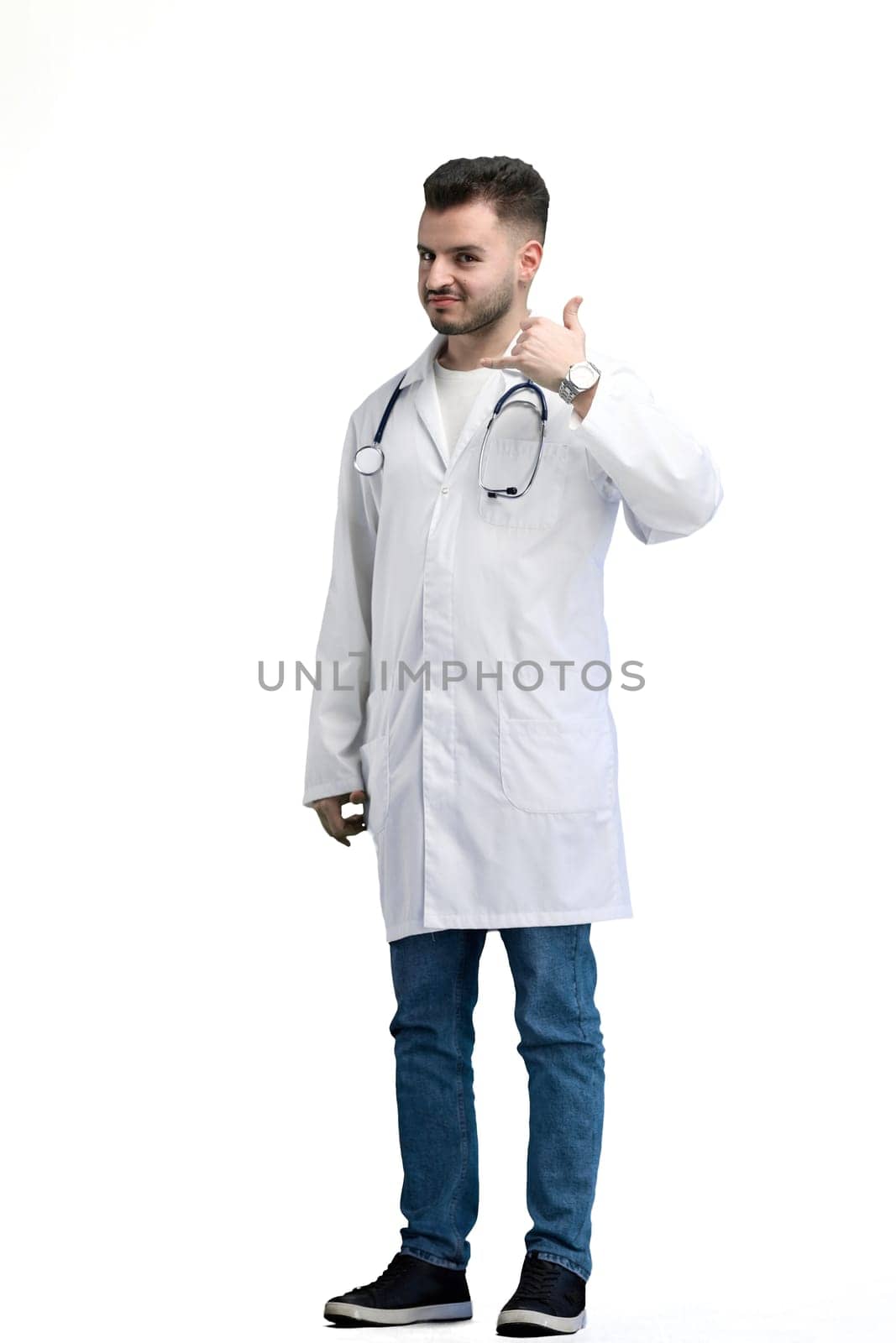Doctor, in full height, on a white background, showing a call sign.