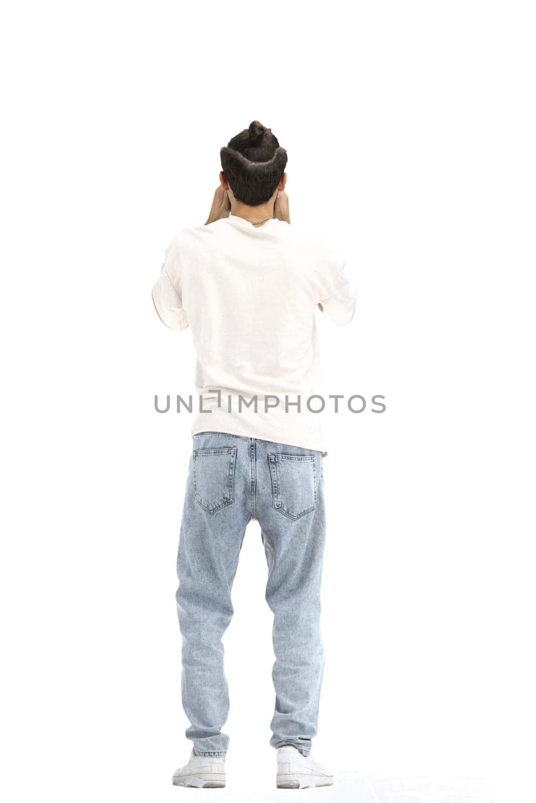 A man, full-length, on a white background.