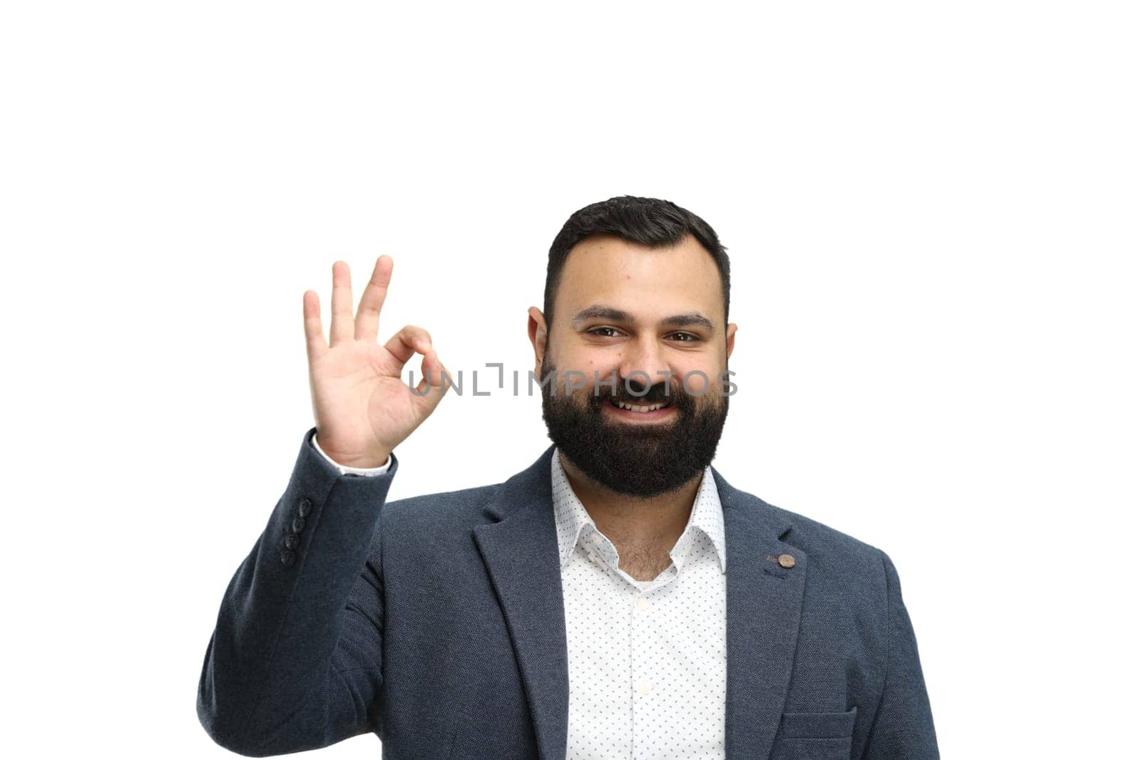 A man, close-up, on a white background, shows an ok sign by Prosto