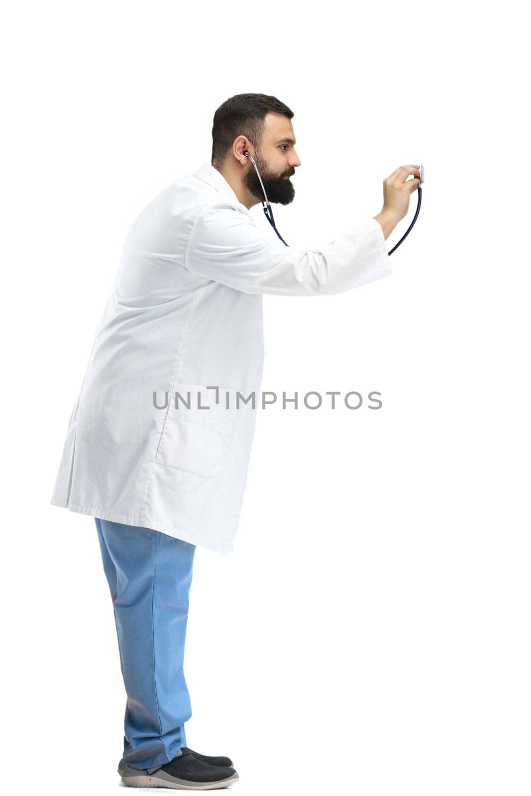 Male doctor, full-length, on a white background, with a stethoscope.