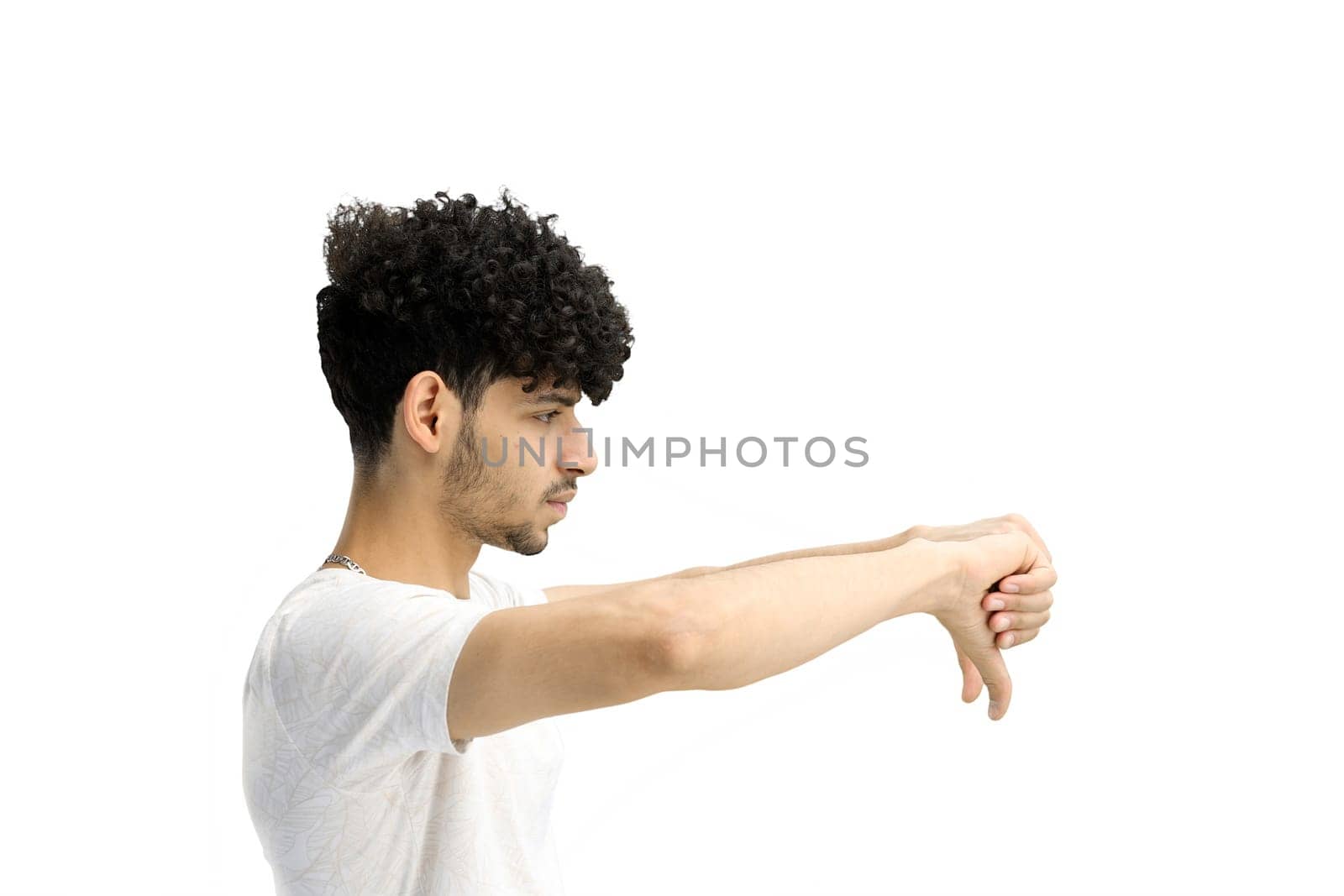 A man, on a white background, in close-up, shows his finger down by Prosto