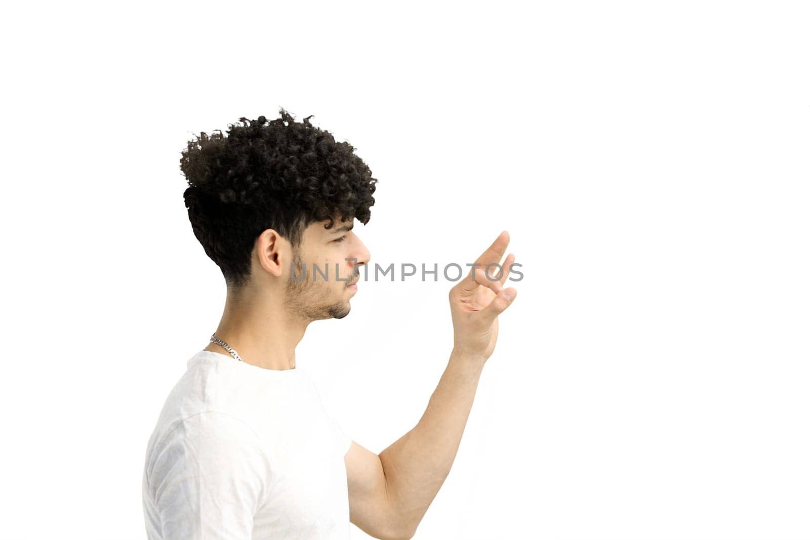 A man, on a white background, in close-up, shows an ok sign.
