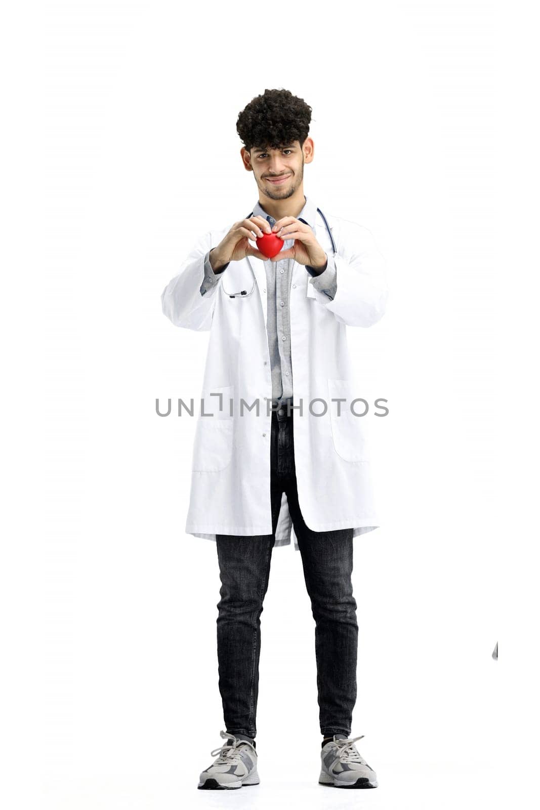 Male doctor, full-length, on a white background, shows a heart by Prosto
