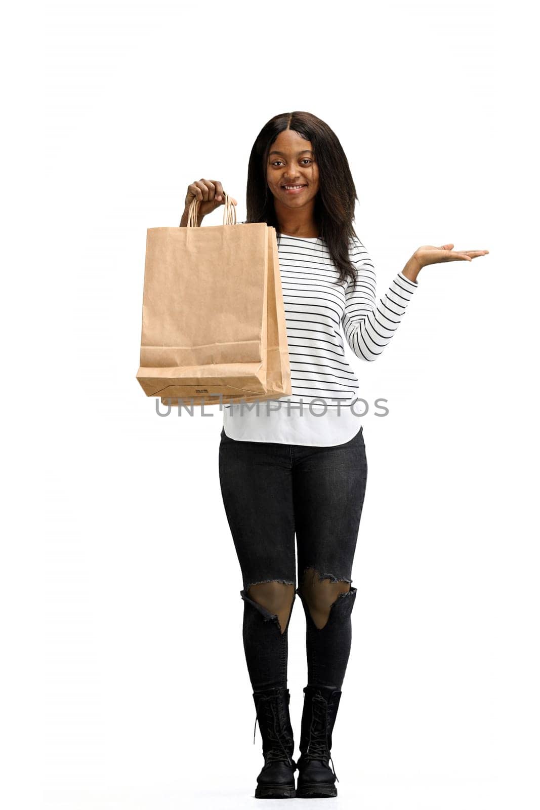 A woman, full-length, on a white background, with bags by Prosto