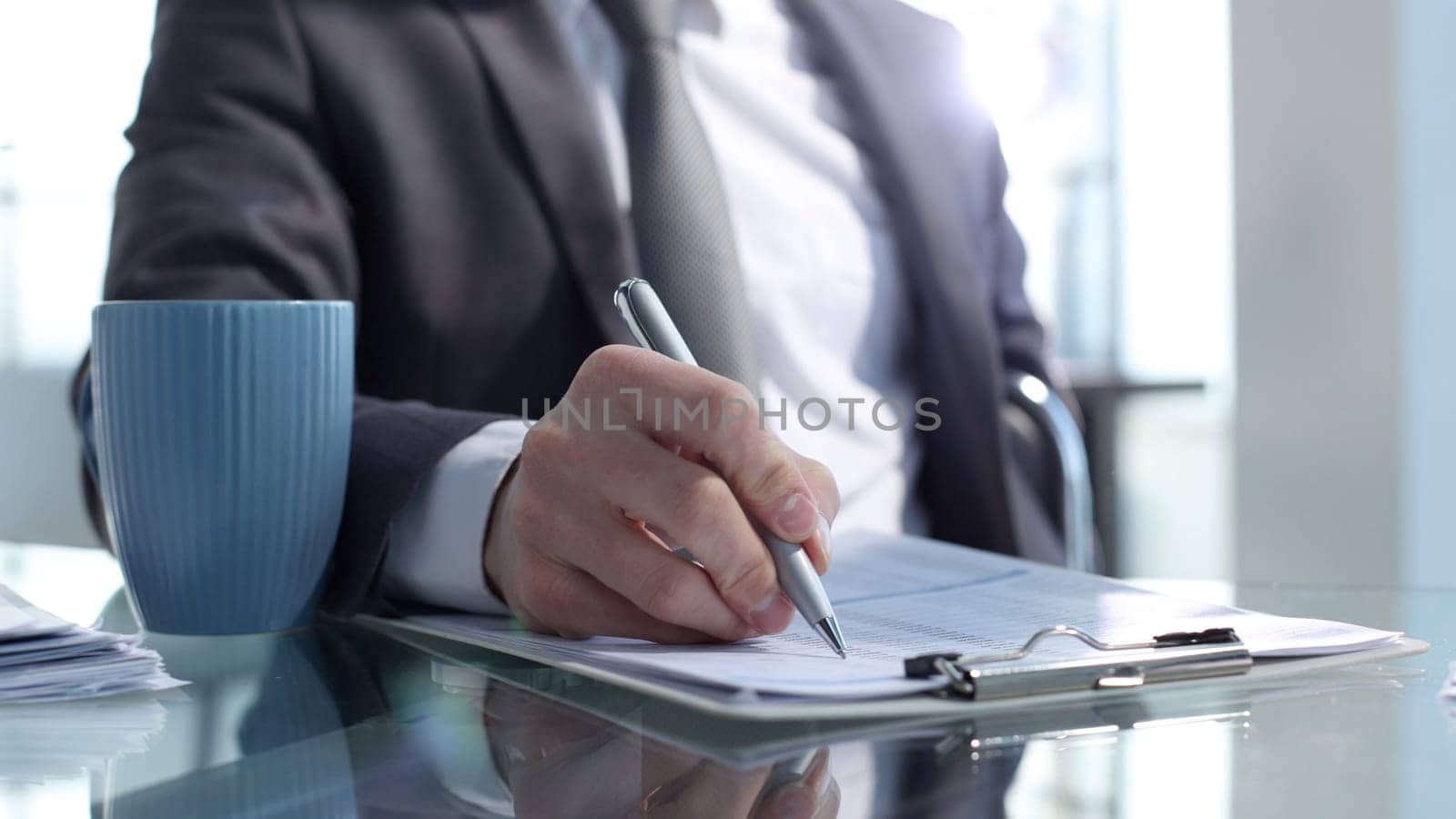 Checking documents for a business meeting by Prosto