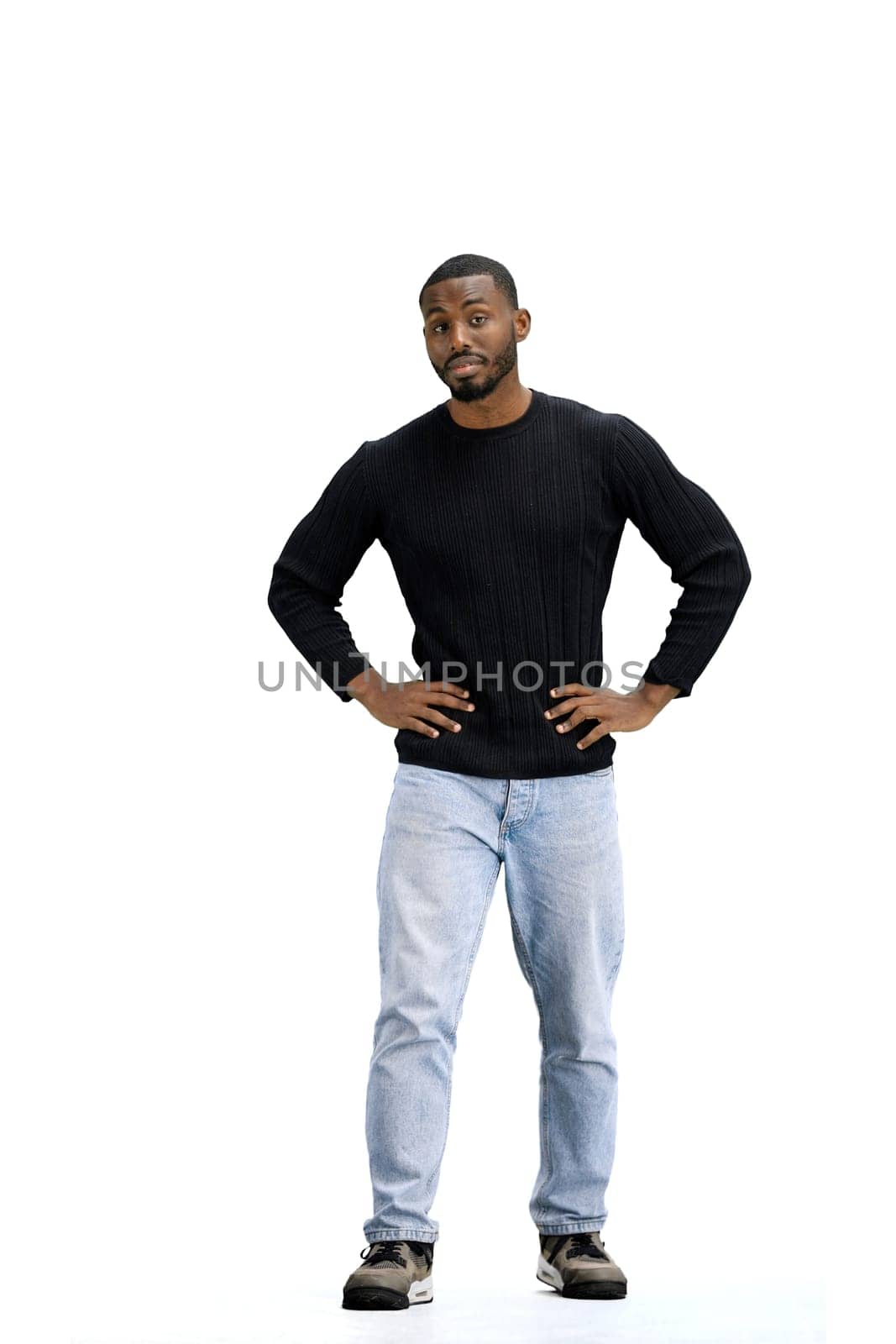 A man, full-length, on a white background, holds his hands on his hips by Prosto