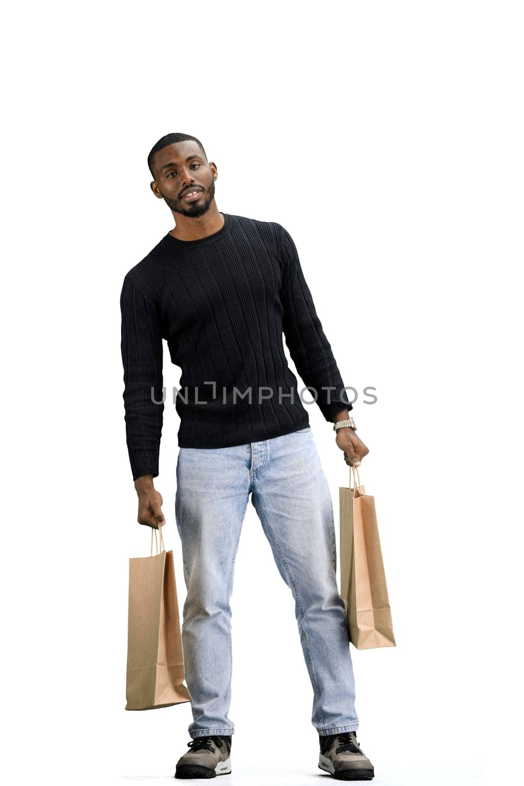 A man, full-length, on a white background, with bags by Prosto