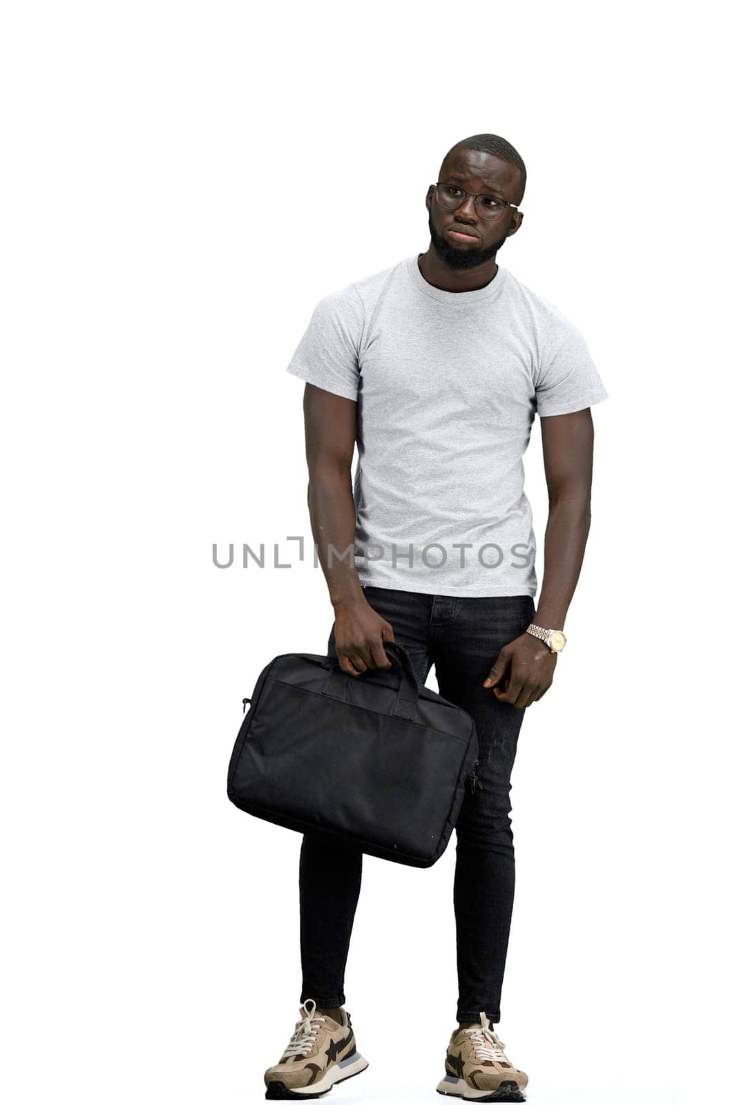 A man, full-length, on a white background, with a briefcase.