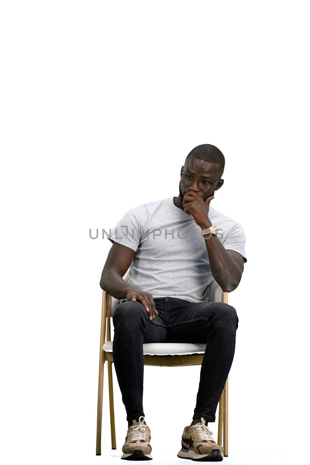 A man, on a white background, sitting on a chair by Prosto