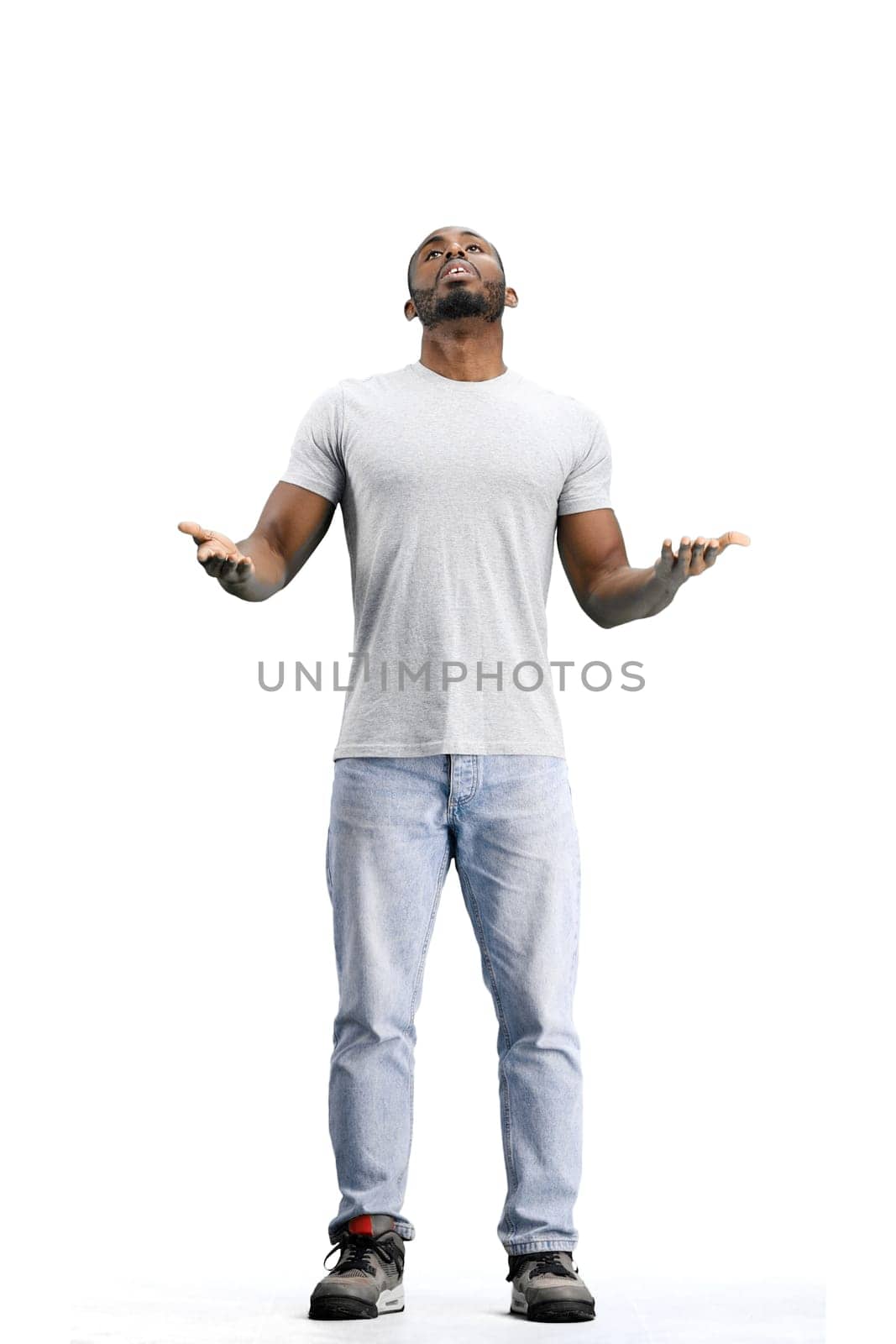 A man, full-length, on a white background, spreads his arms by Prosto