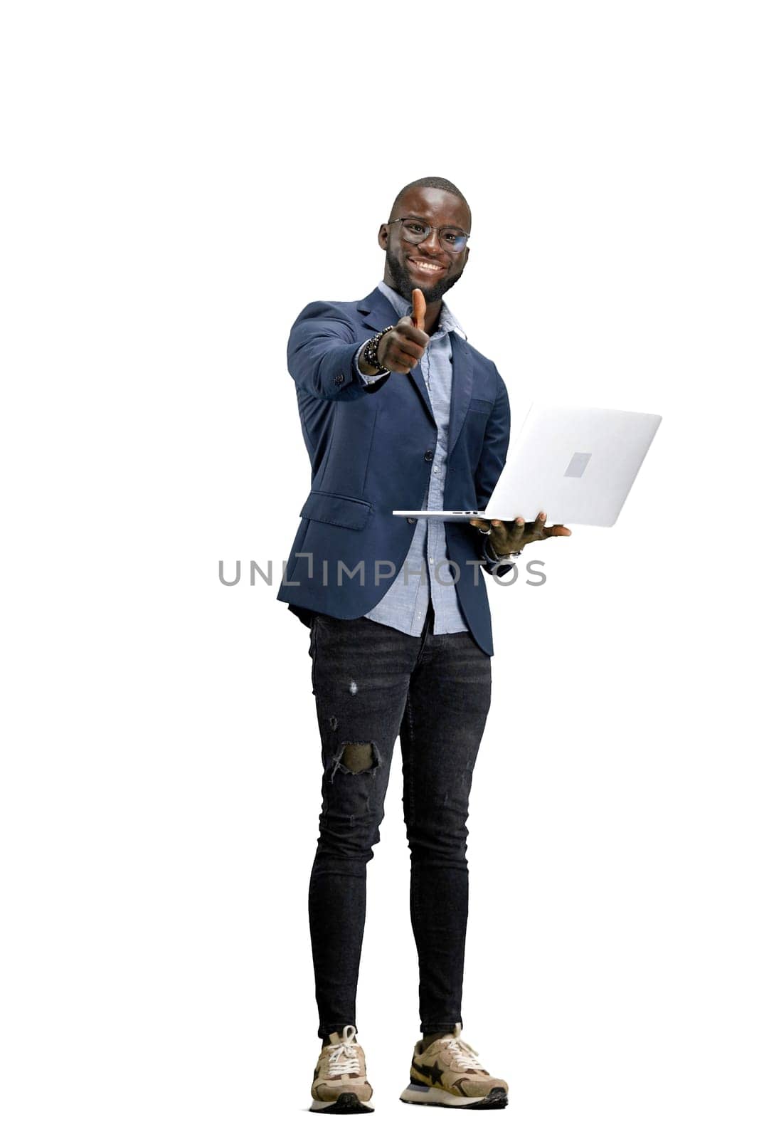 A man, full-length, on a white background, uses a laptop by Prosto