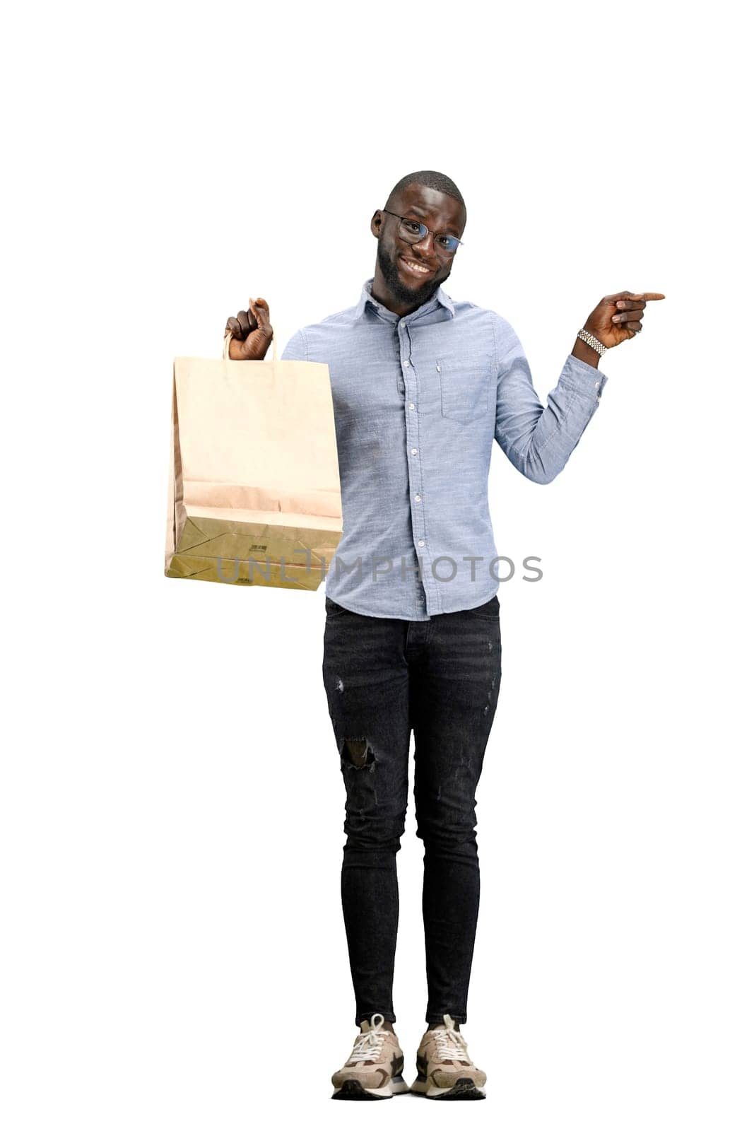 A man, full-length, on a white background, with bags by Prosto