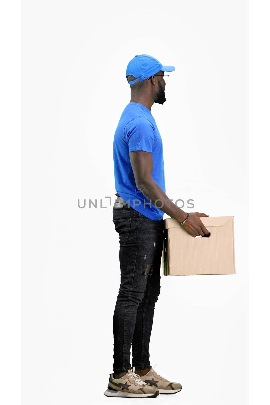 The deliveryman, full-length, on a white background, with a box by Prosto