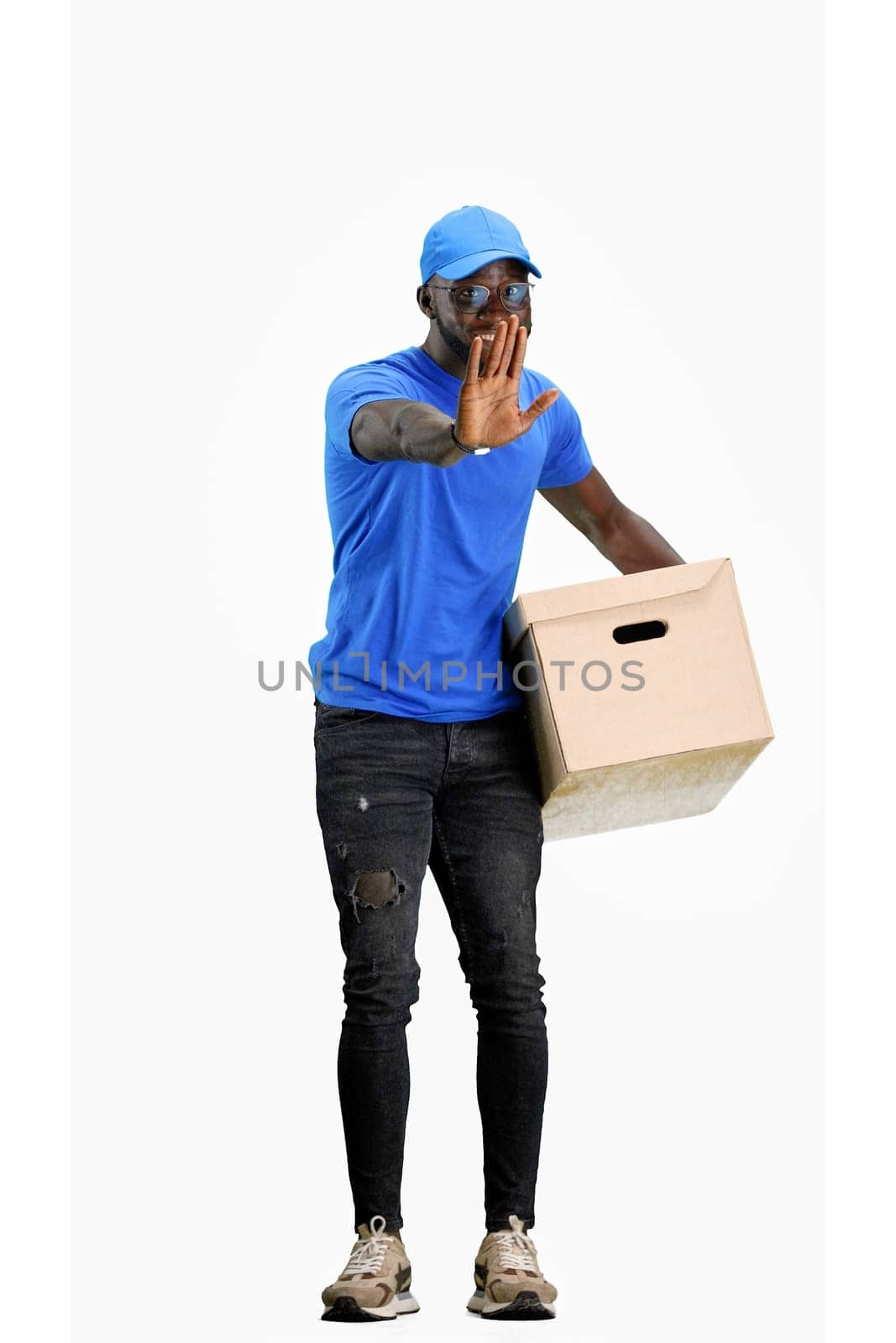 The deliveryman, in full height, on a white background, shows a stop sign by Prosto