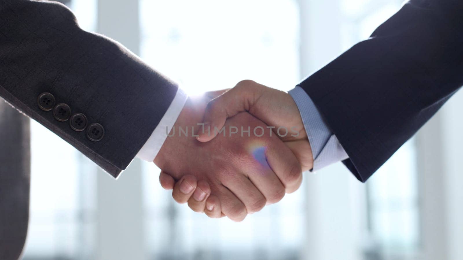 Handshake after a deal, successful deal, teamwork.
