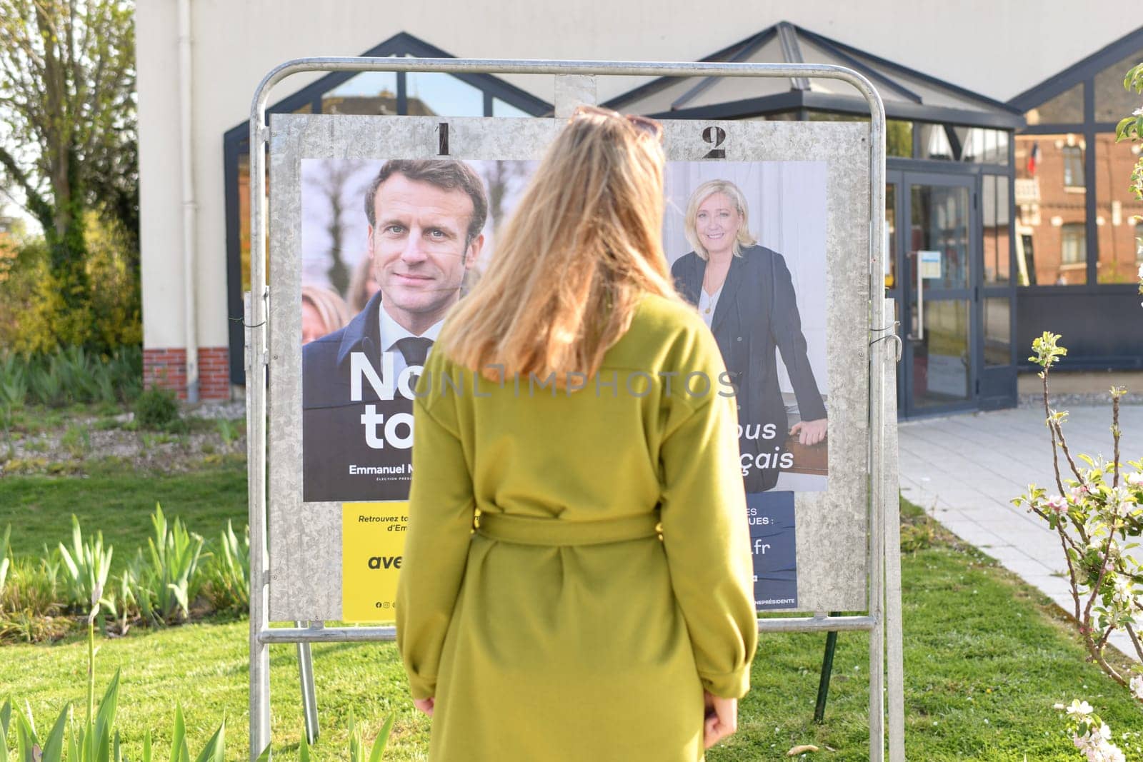 PARIS, FRANCE - APRIL 20, 2022 : The banners with candidates for President elections 2022 by Godi
