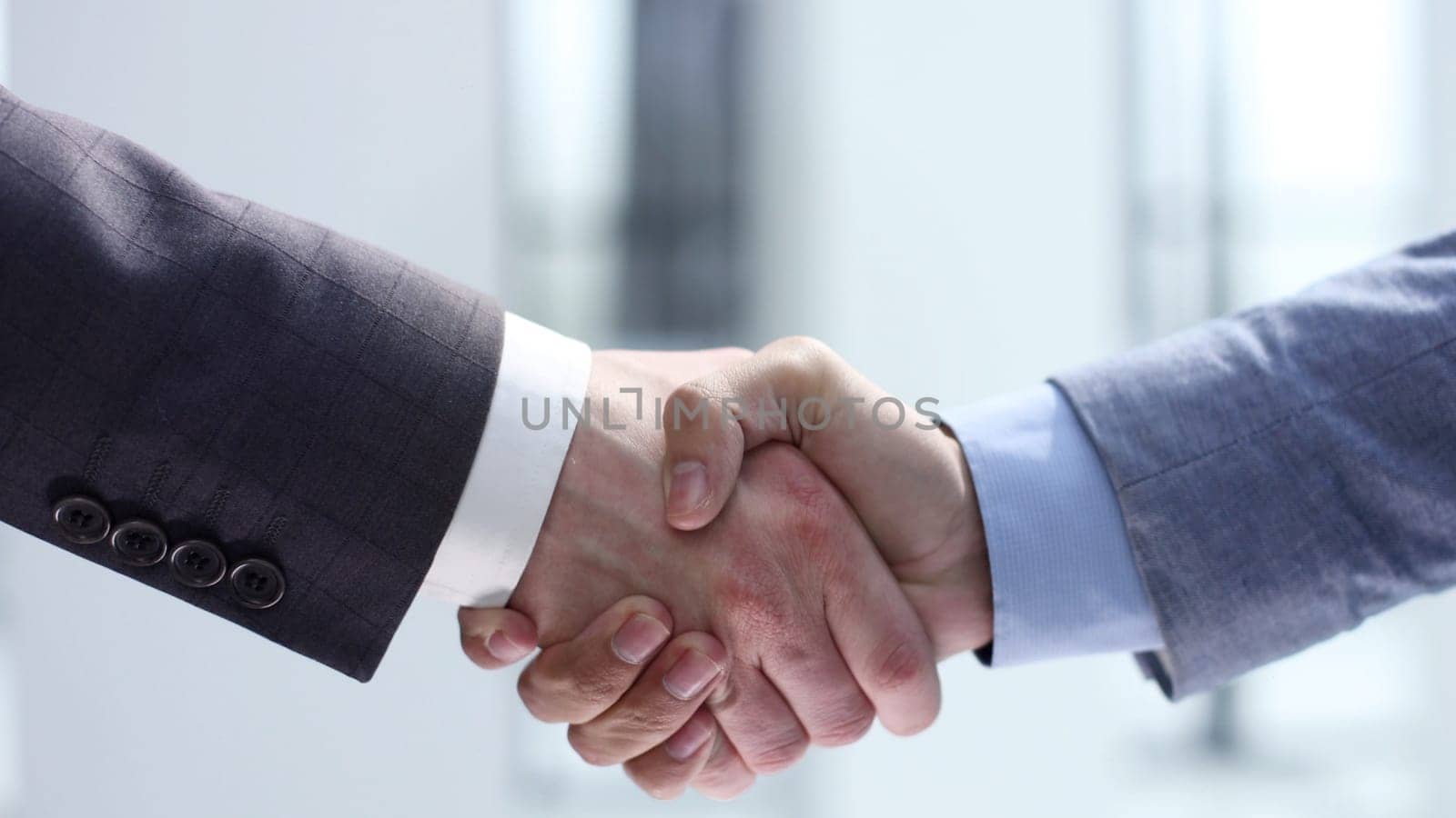 Handshake, agreement after the transaction.