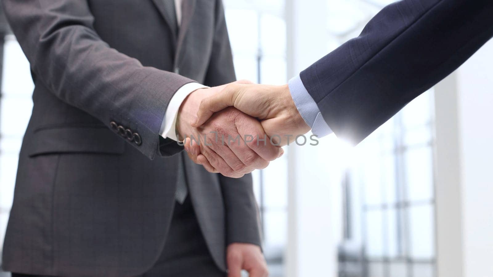 Handshake, agreement after the transaction.