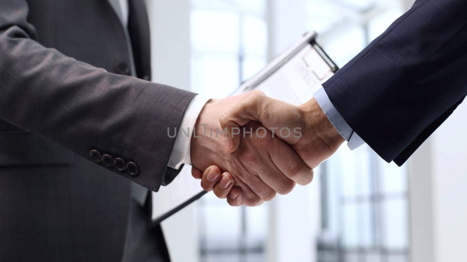 Handshake, agreement after the transaction by Prosto