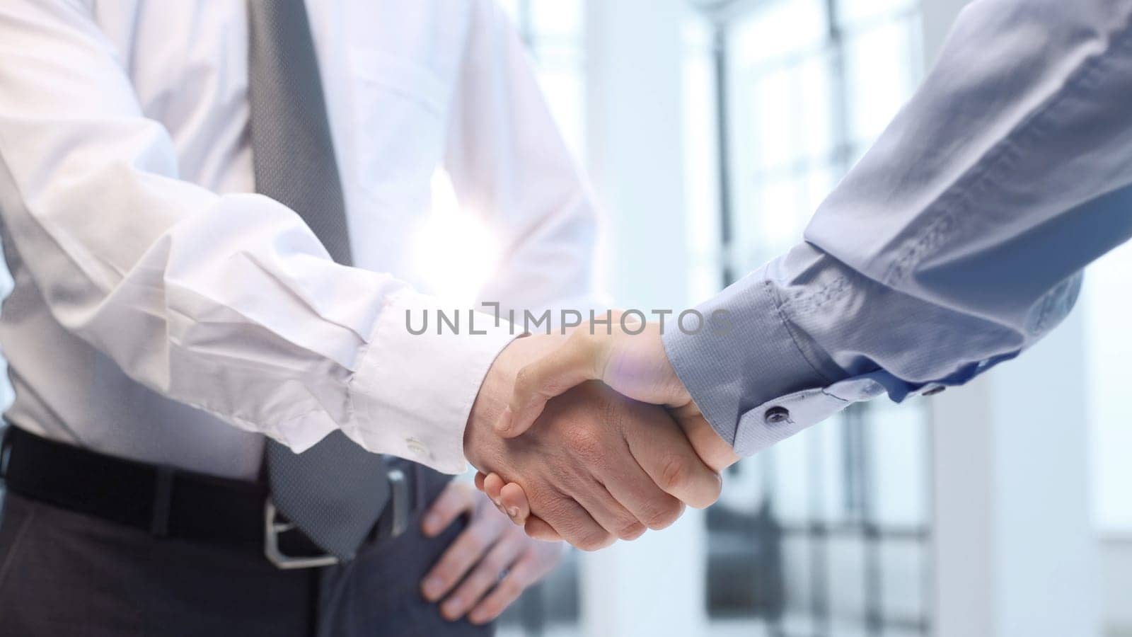 Handshake and congratulations after the transaction by Prosto