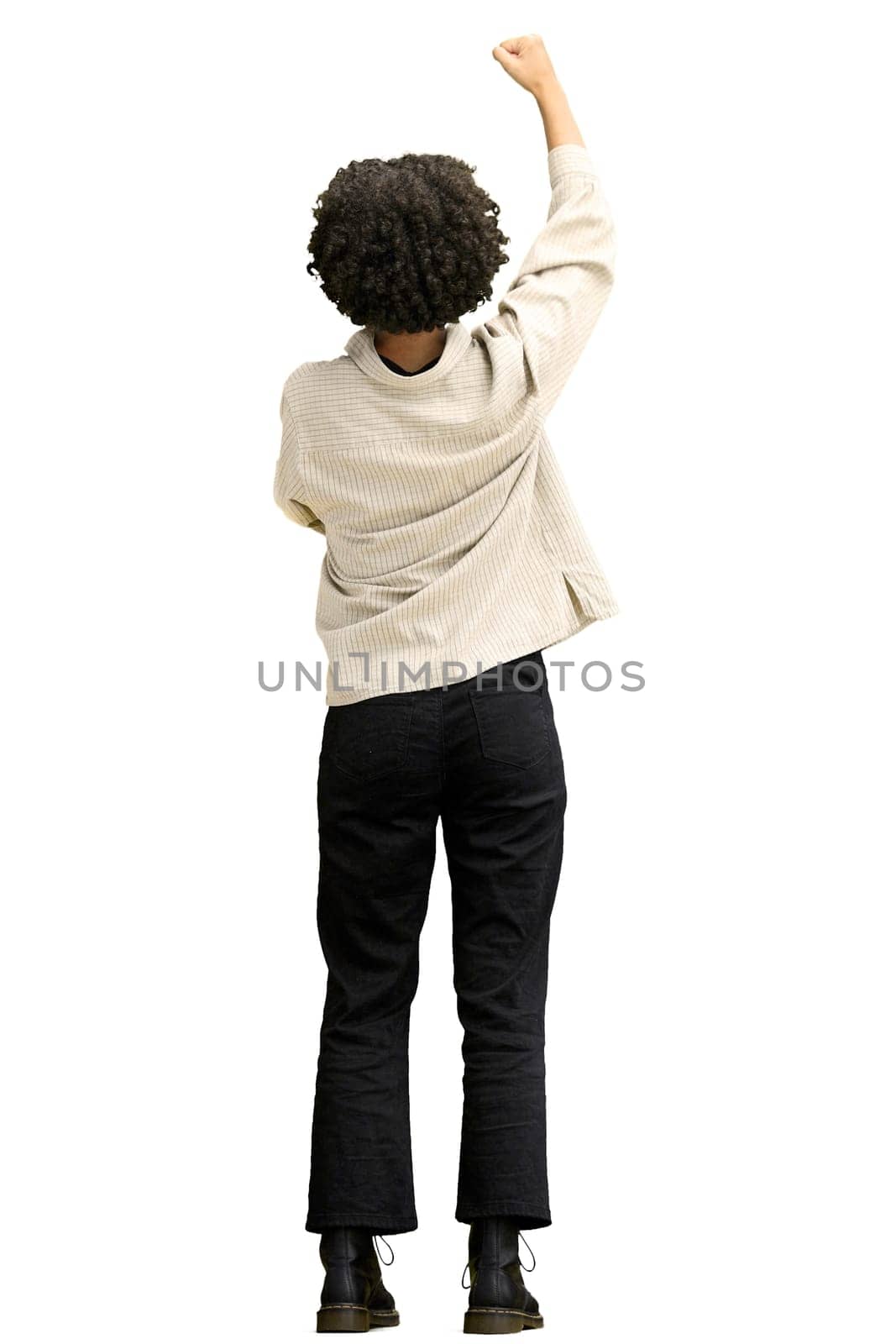 A woman, full-length, on a white background, rejoices.