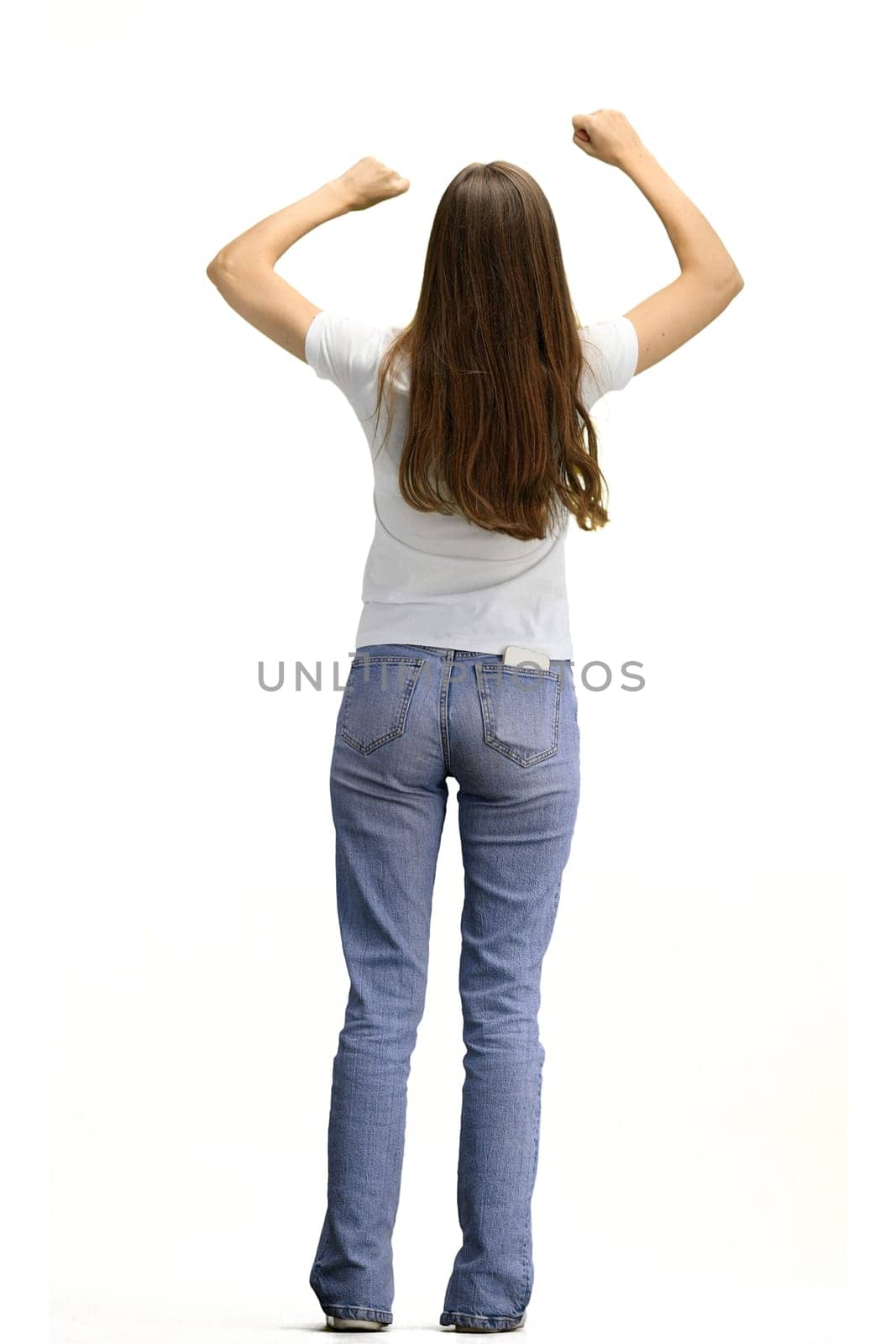 A woman, full-length, on a white background, raises her hands up by Prosto