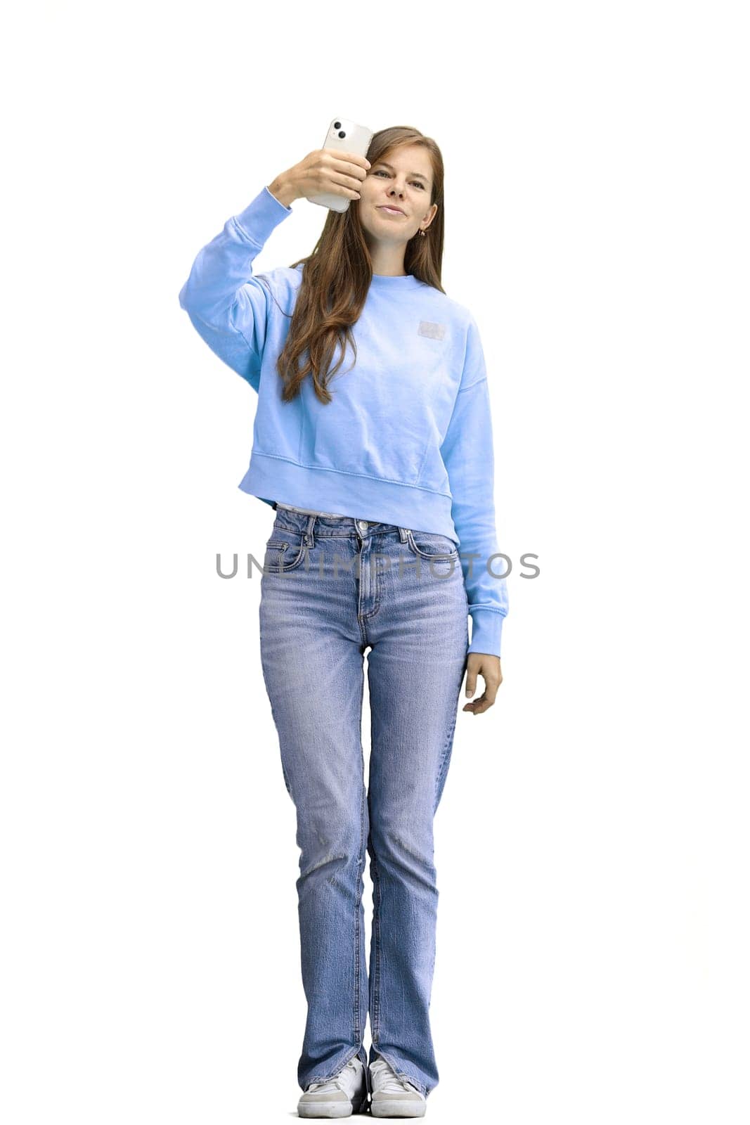 A woman, full-length, on a white background, with a phone by Prosto