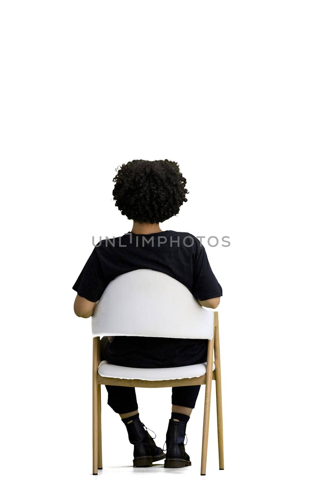 A woman, full-length, on a white background, sitting on a chair by Prosto