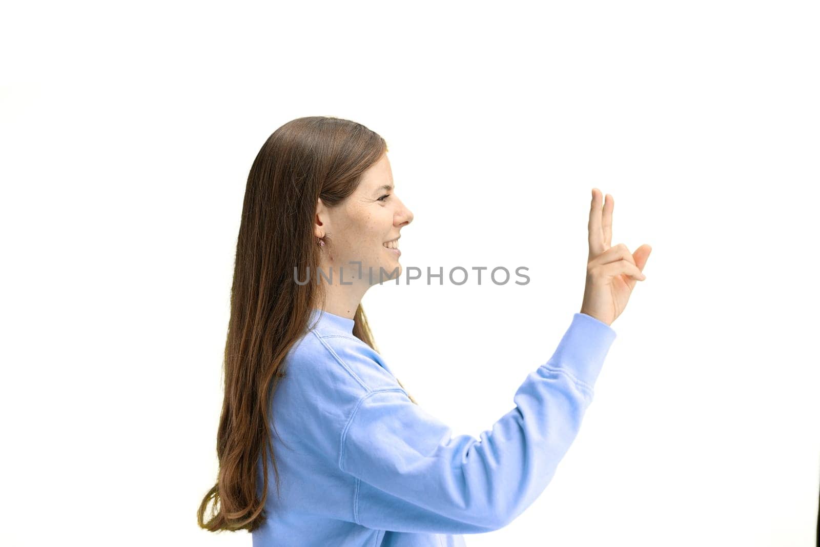 A woman, close-up, on a white background, shows a victory sign by Prosto