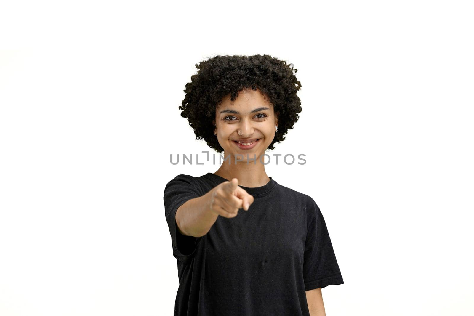 A woman, close-up, on a white background, points forward by Prosto
