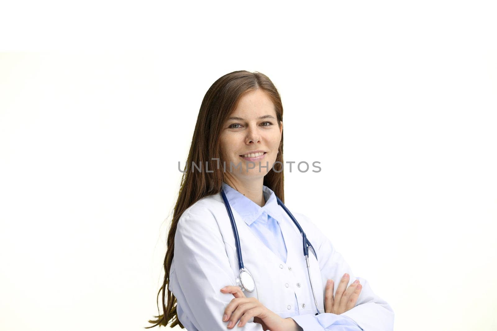 A female doctor, close-up, on a white background, crossed her arms by Prosto