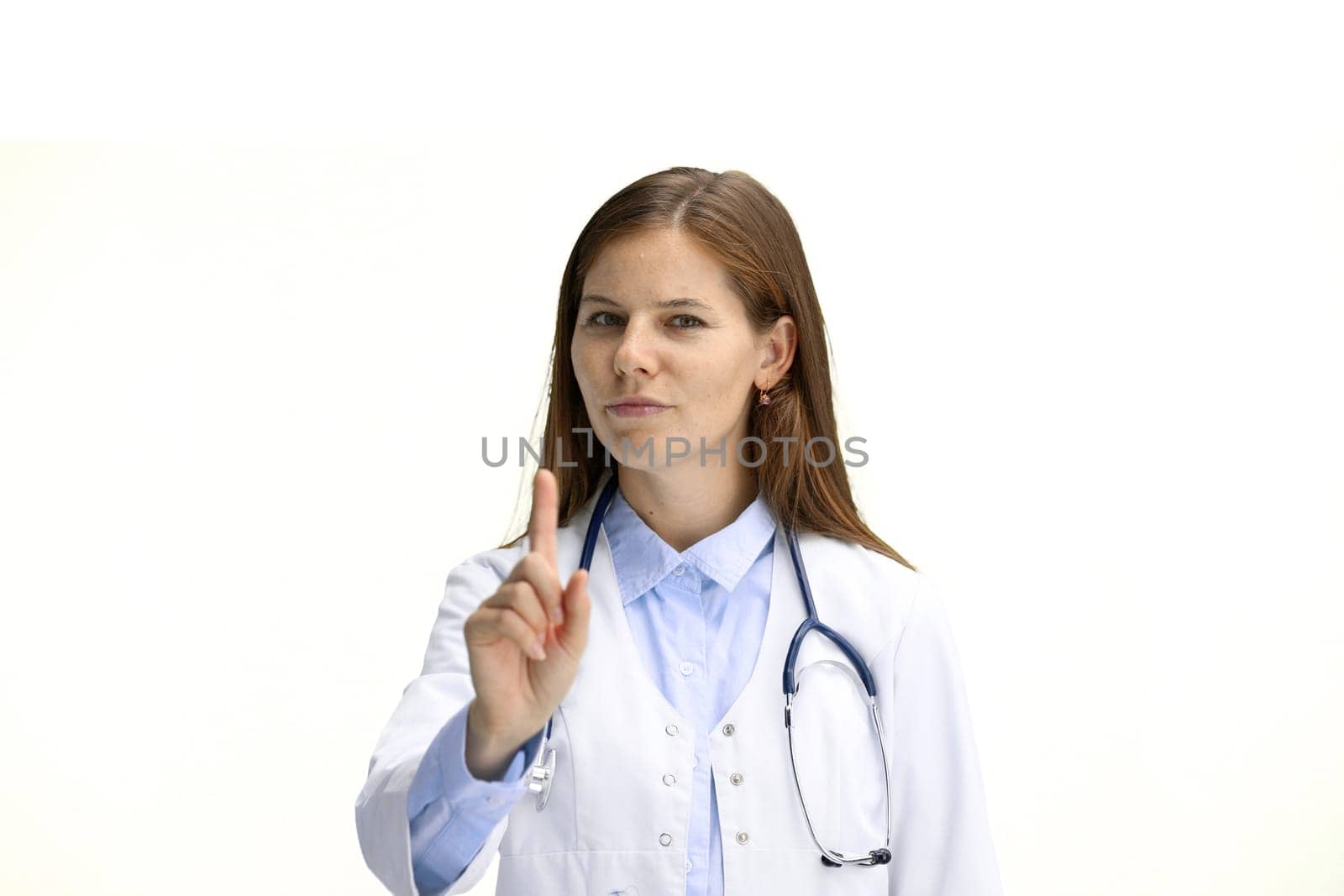 Female doctor, close-up, on a white background, shows an important sign by Prosto
