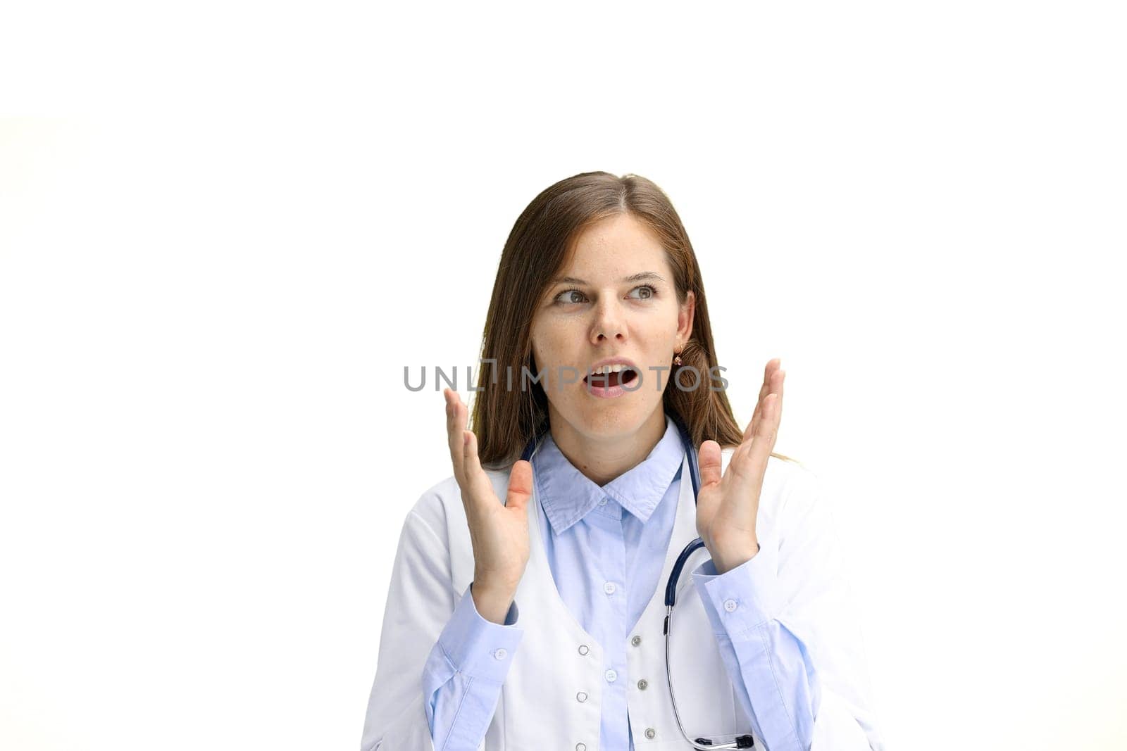 Female doctor, close-up, on a white background, is surprised.