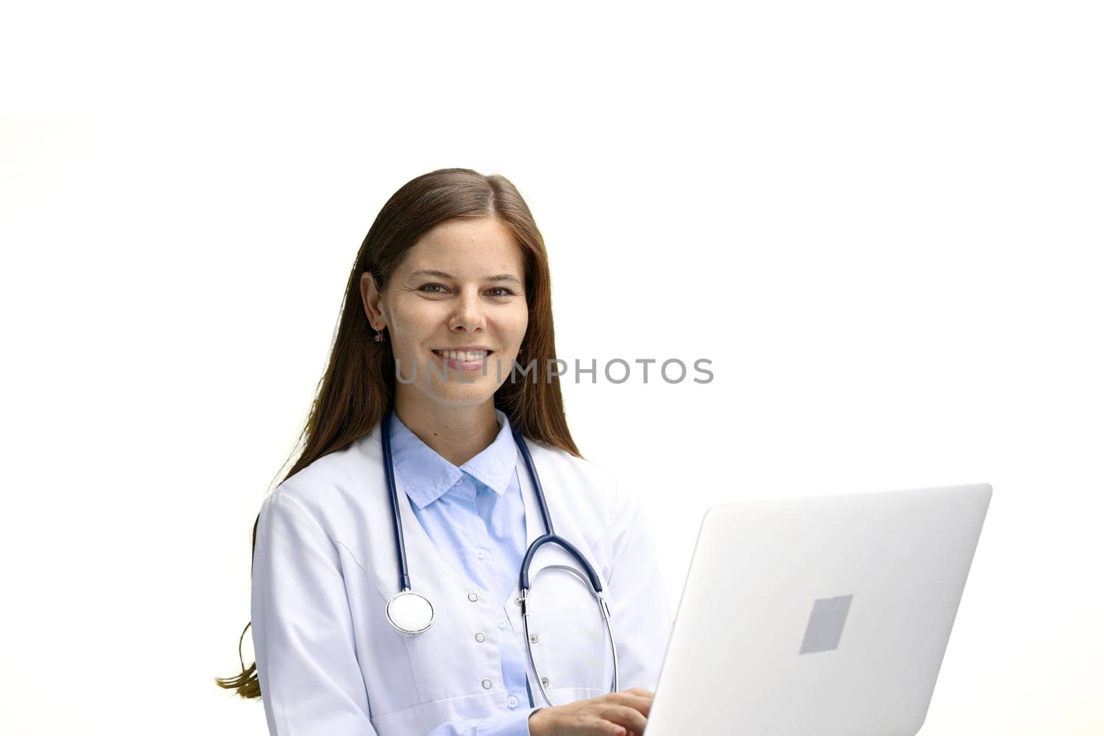 Female doctor, close-up, on a white background, with a laptop.