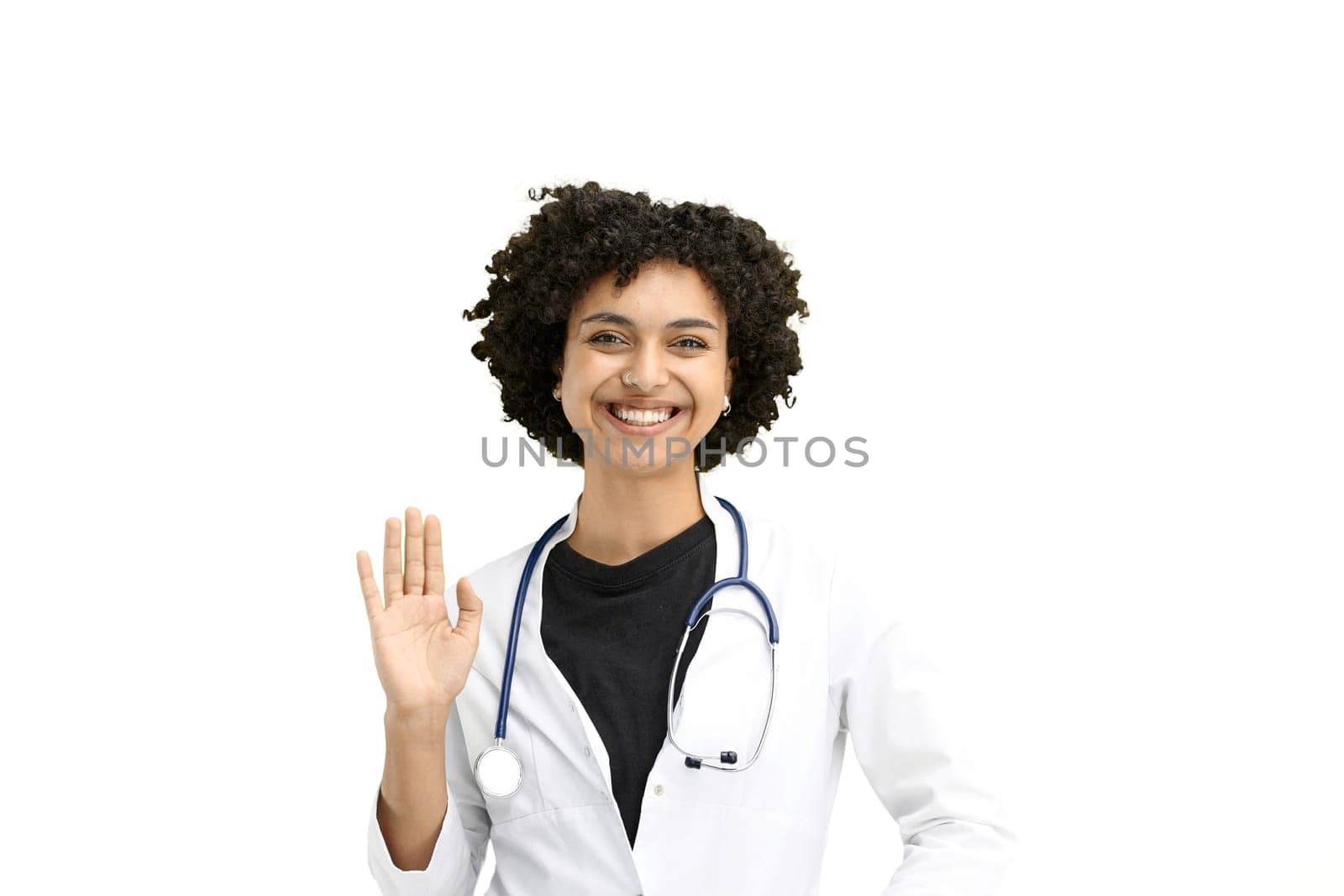 Female doctor, close-up, on a white background, waving her hand.