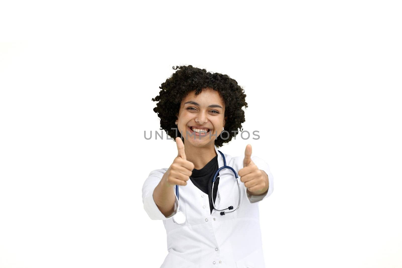 Female doctor, close-up, on a white background, shows thumbs up by Prosto