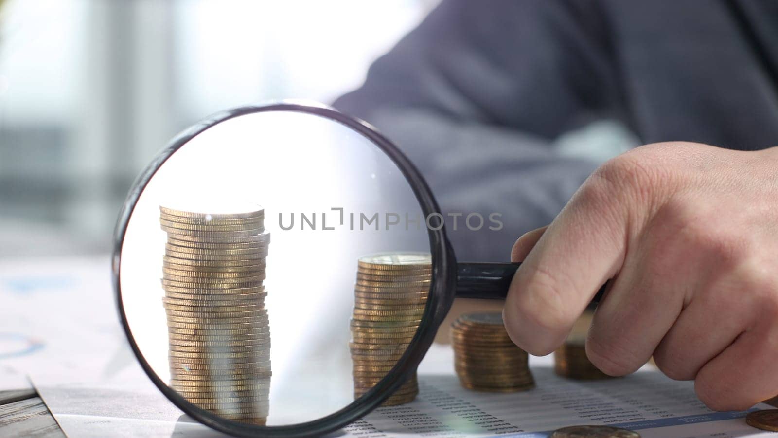 Coins under magnification, successful business.
