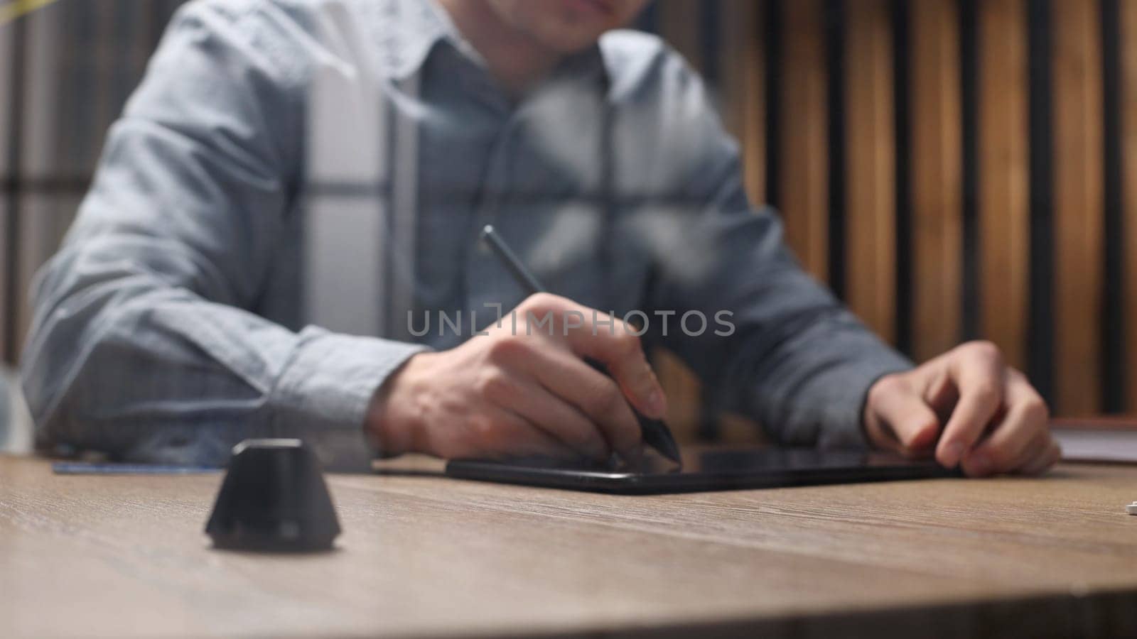 The artist uses a graphic tablet for an art concept.