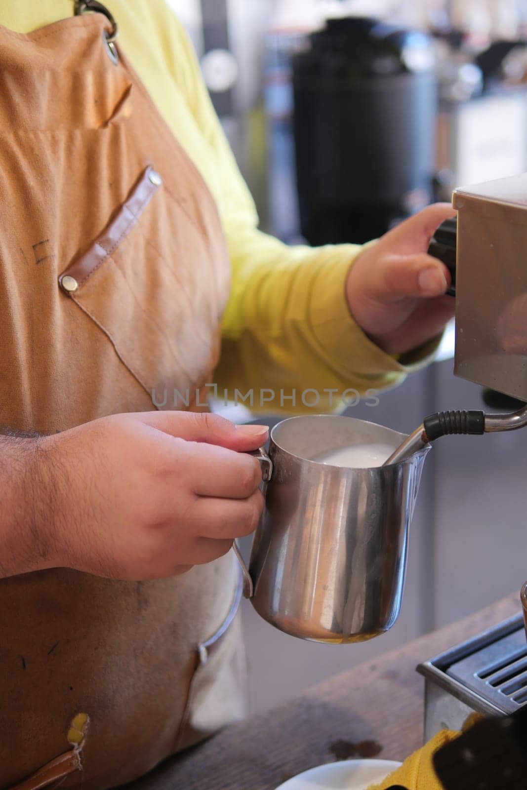 making late coffee in a cafe .