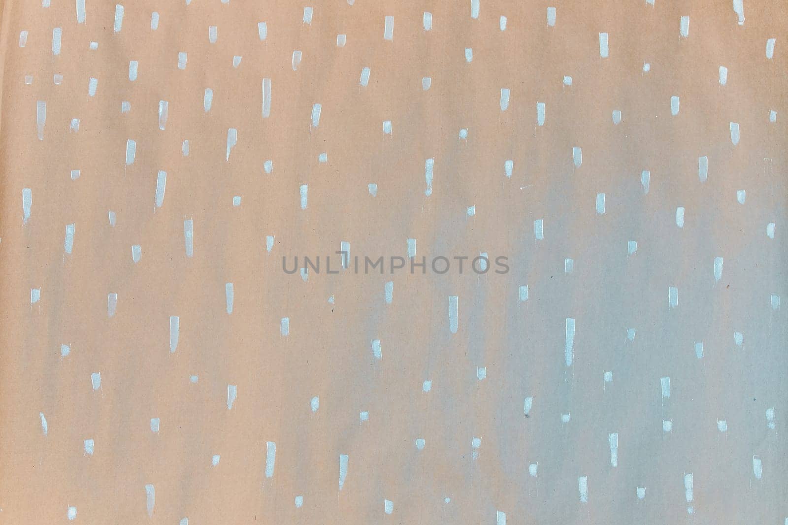 Gift wrapping paper texture. Painted paper, the concept of small Golden blots, in the form of snowflakes.