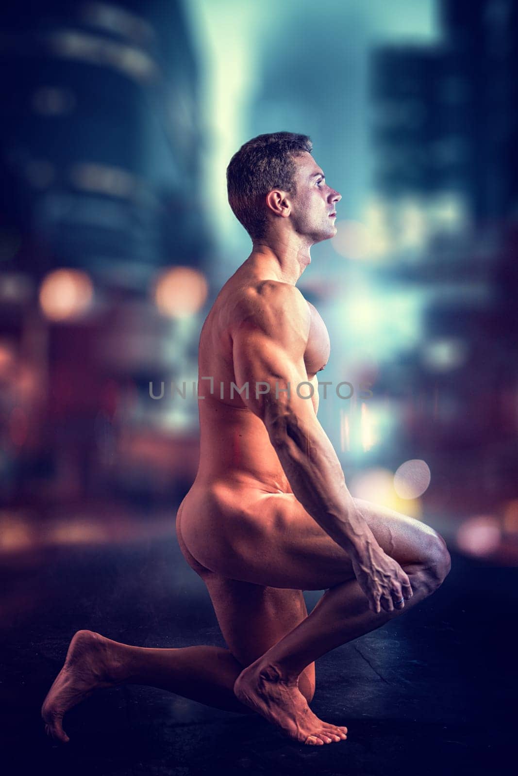 A photo capturing a naked man sitting in the midst of a bustling city, surrounded by skyscrapers and busy streets. The man appears contemplative as he sits exposed in a public space.