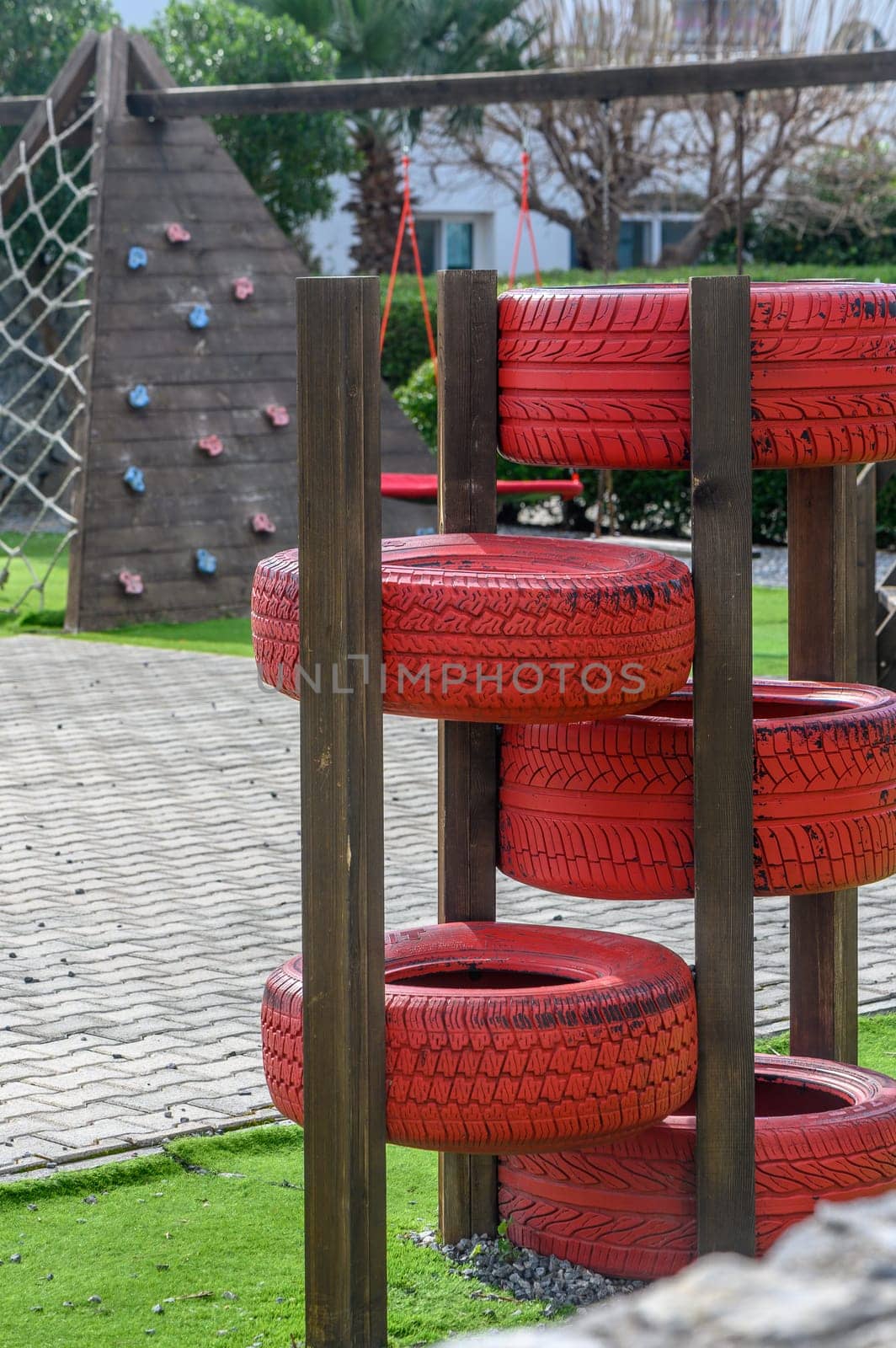 children's playground made from car tires, tire recycling