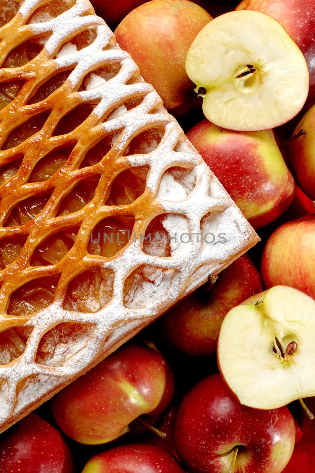 Sweet lattice fruit galette on checkered tablecloth with ripe apples by nazarovsergey